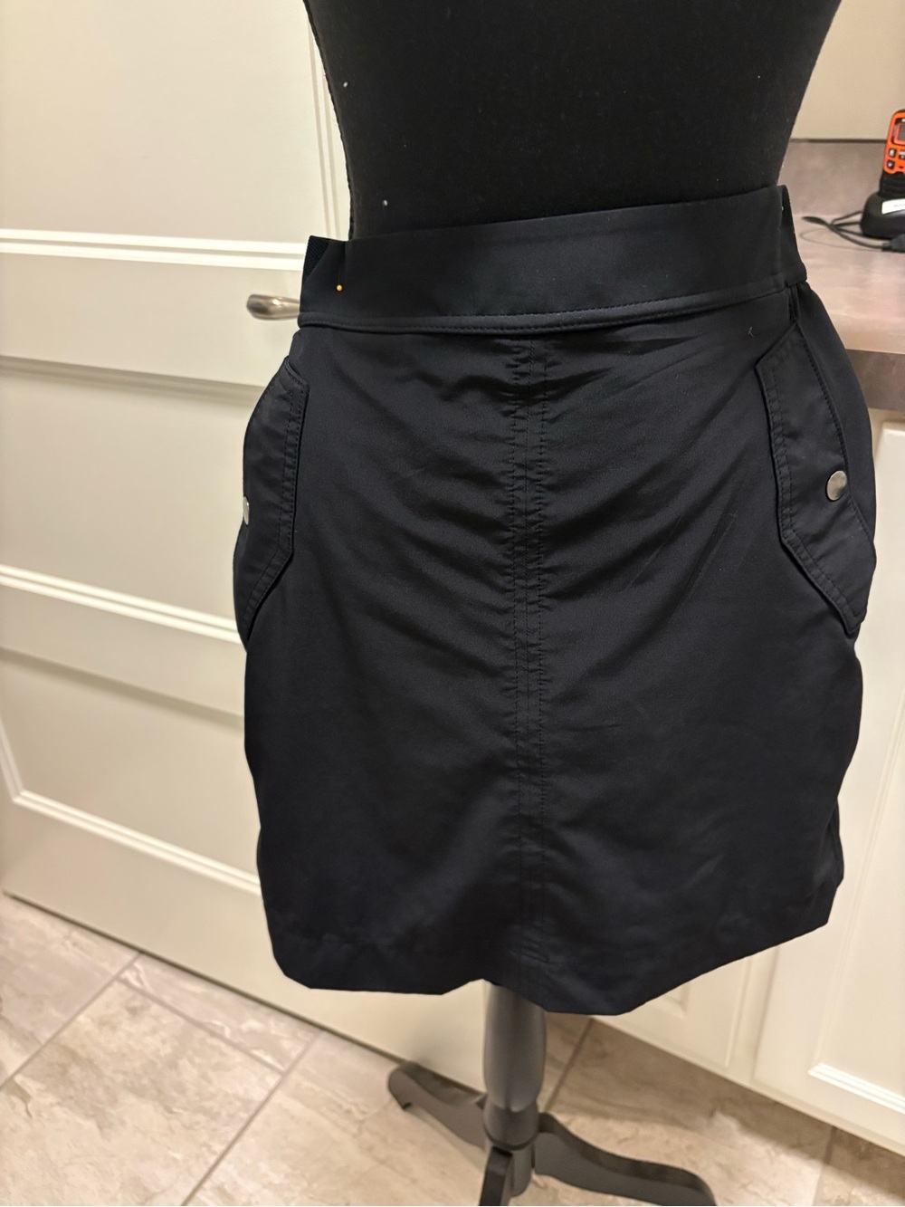 Athleta Black Mini Skirt with Snap-Pocket Detail